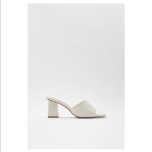 White heels (never worn)